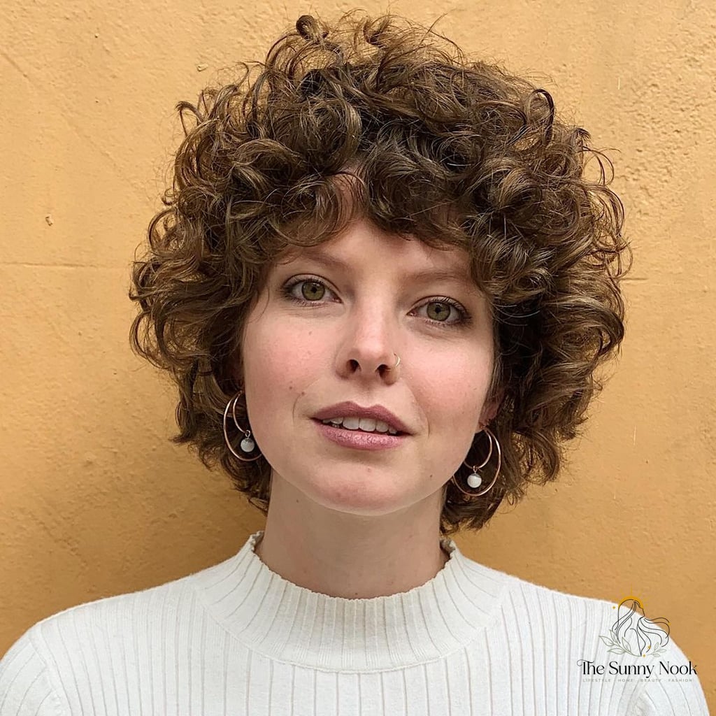 25 Hairstyles Short Curly Hair That Belong on Your Inspiration Board 4 50s-Inspired Pretty Curly Hair with Bangs
