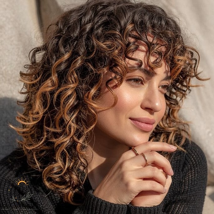 21 Cute Hairstyles For Short Curly Hair That Belong on Your Inspiration Board 2 Balayage-Kissed Curls