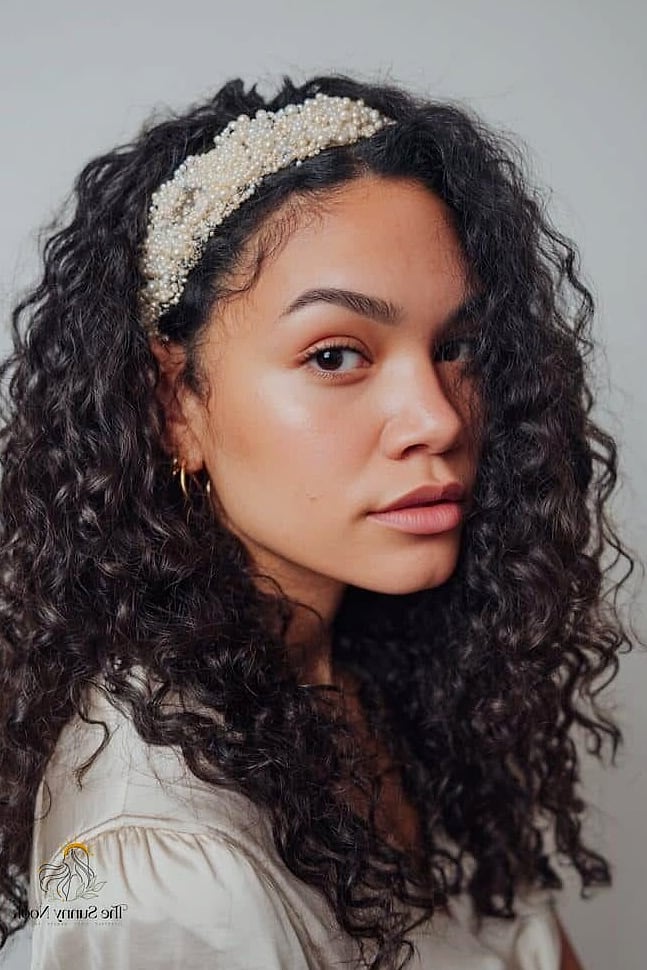 21 Headband Hairstyles Curly Hair Everyone Is Pinning Right Now 11 Beaded Headband on Defined Ringlets