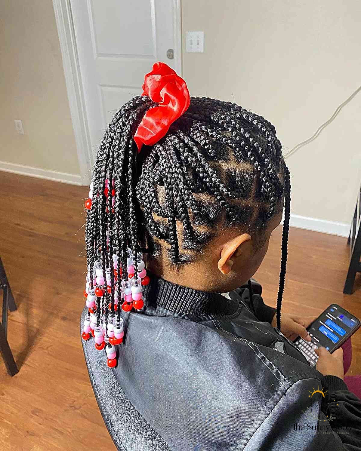 10 Color Knotless Braids for the Ultimate Glow Up 11 Box Braided High Ponytail with Red Beads