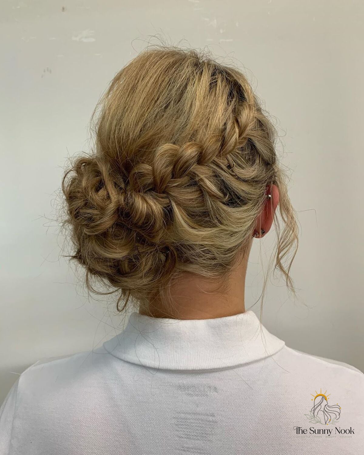 9 Braid Bun Hairstyles You'll Want to Re-Create Immediately 6 Braided Bun With Loose Side Braids