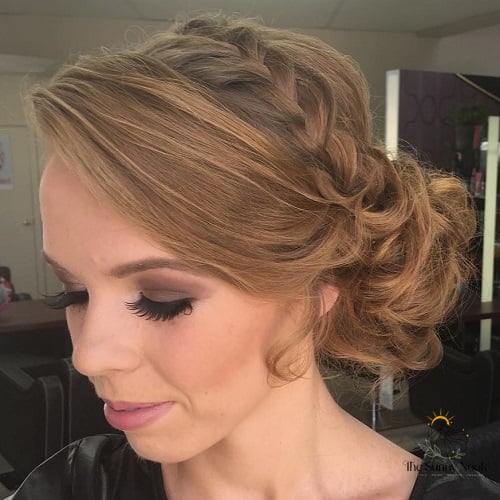 12 Side Bun Hairstyles We're Obsessed With Right Now 13 Braided Crown and Curly Bun
