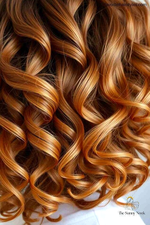 9 Gorgeous Curly Hairstyles Ideas for Every Hair Type 10 Caramel Brown Natural Layered Hair with Bangs
