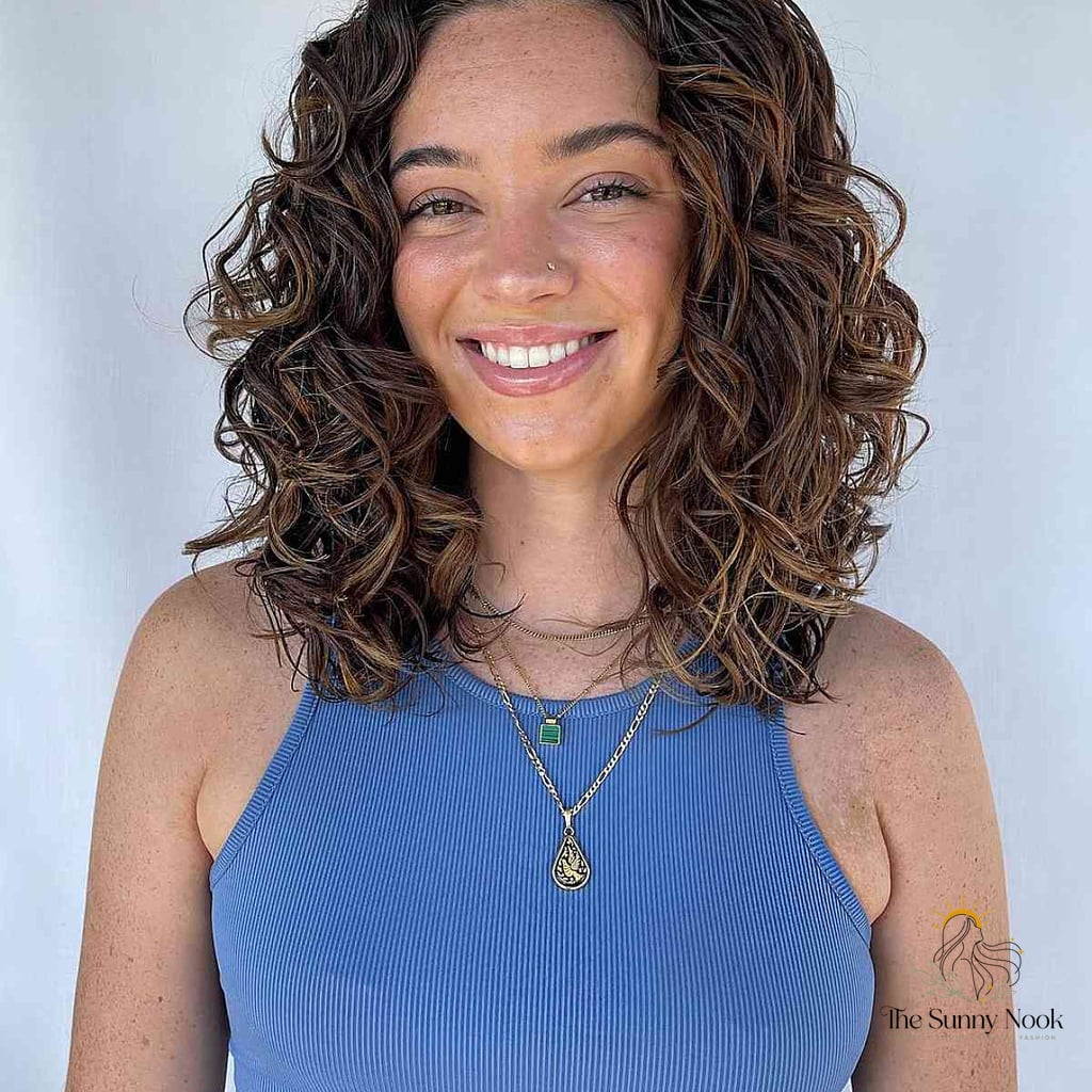 11 Hairstyles For Medium Length Hair Curly You'll Want to Re-Create Immediately 7 Cascading Curly Wavy Hair