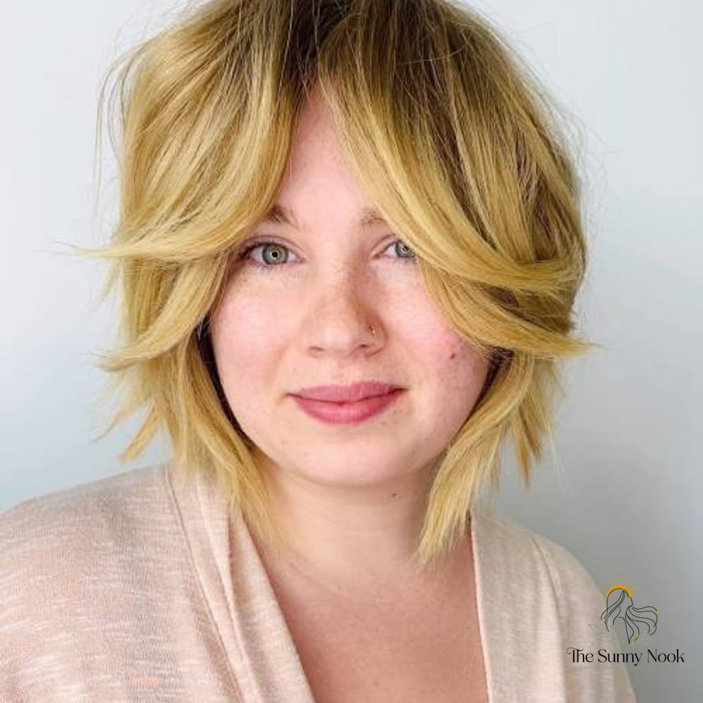 17 Gorgeous Short Hairstyles For Round Faces for Every Hair Type 14 Choppy Bob with Curtain Bangs