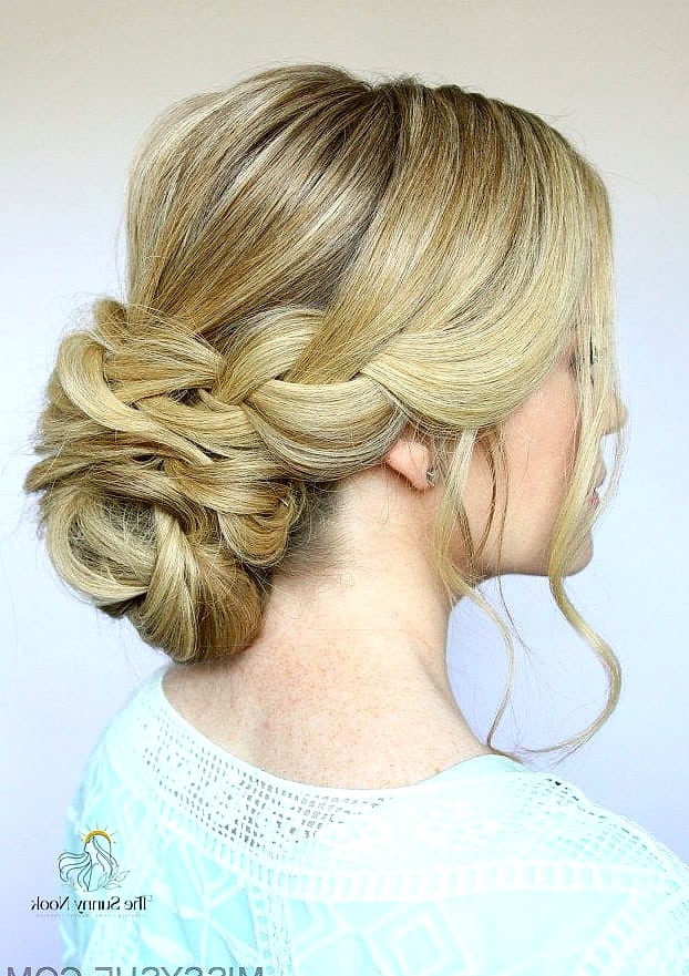 17 Simple Bun Hairstyles That Are Actually Easy to DIY 2 Classic Low Bun