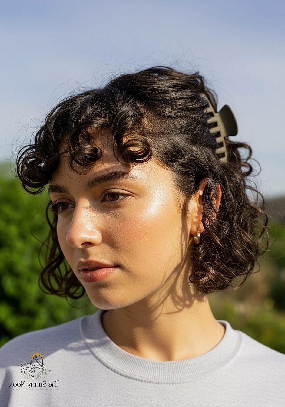 19 Curly Claw Clip Hairstyles to Transform Your Look Instantly 9 Curly Bob Claw Clip Half-Up