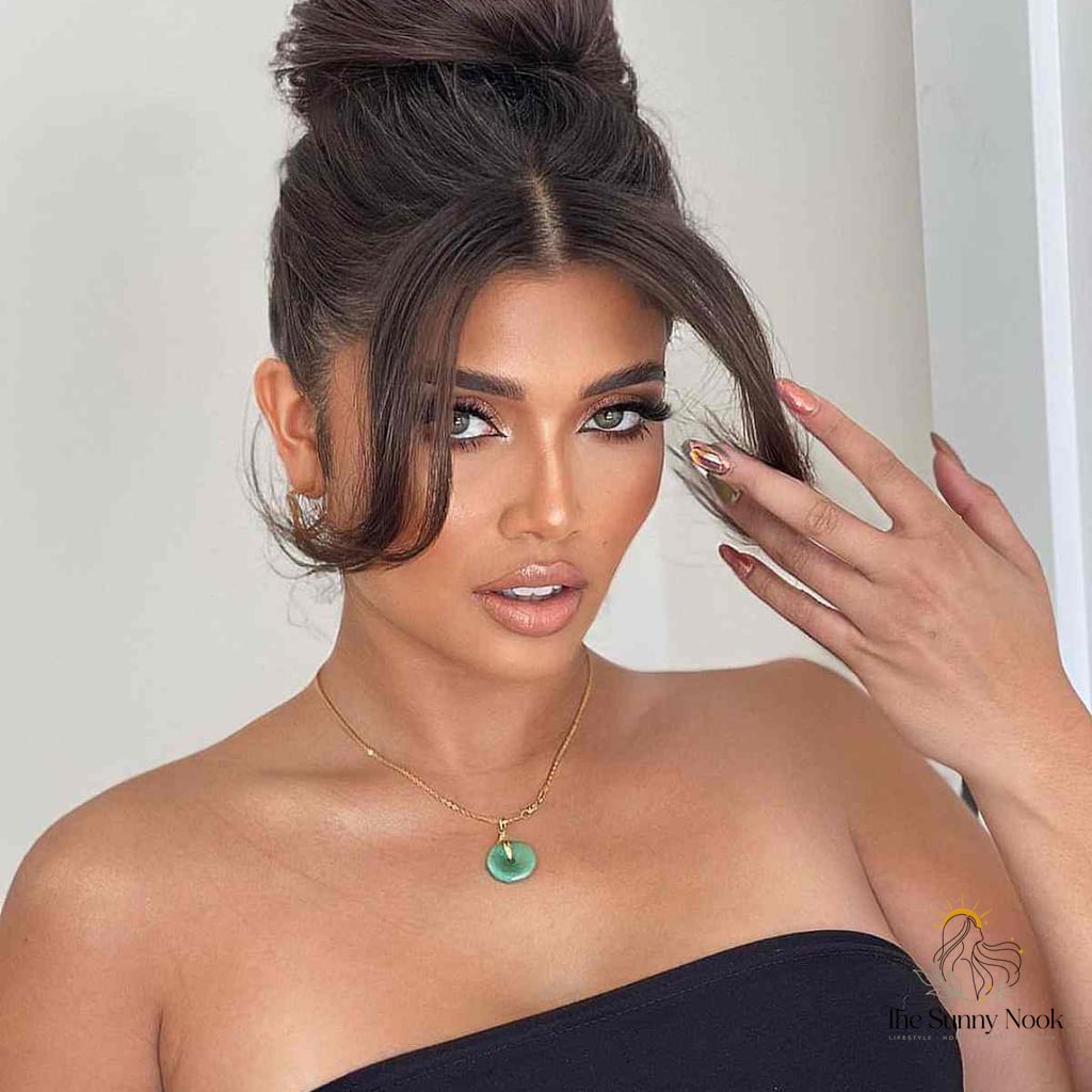 Elegant High Bun with Middle-Parted Bangs