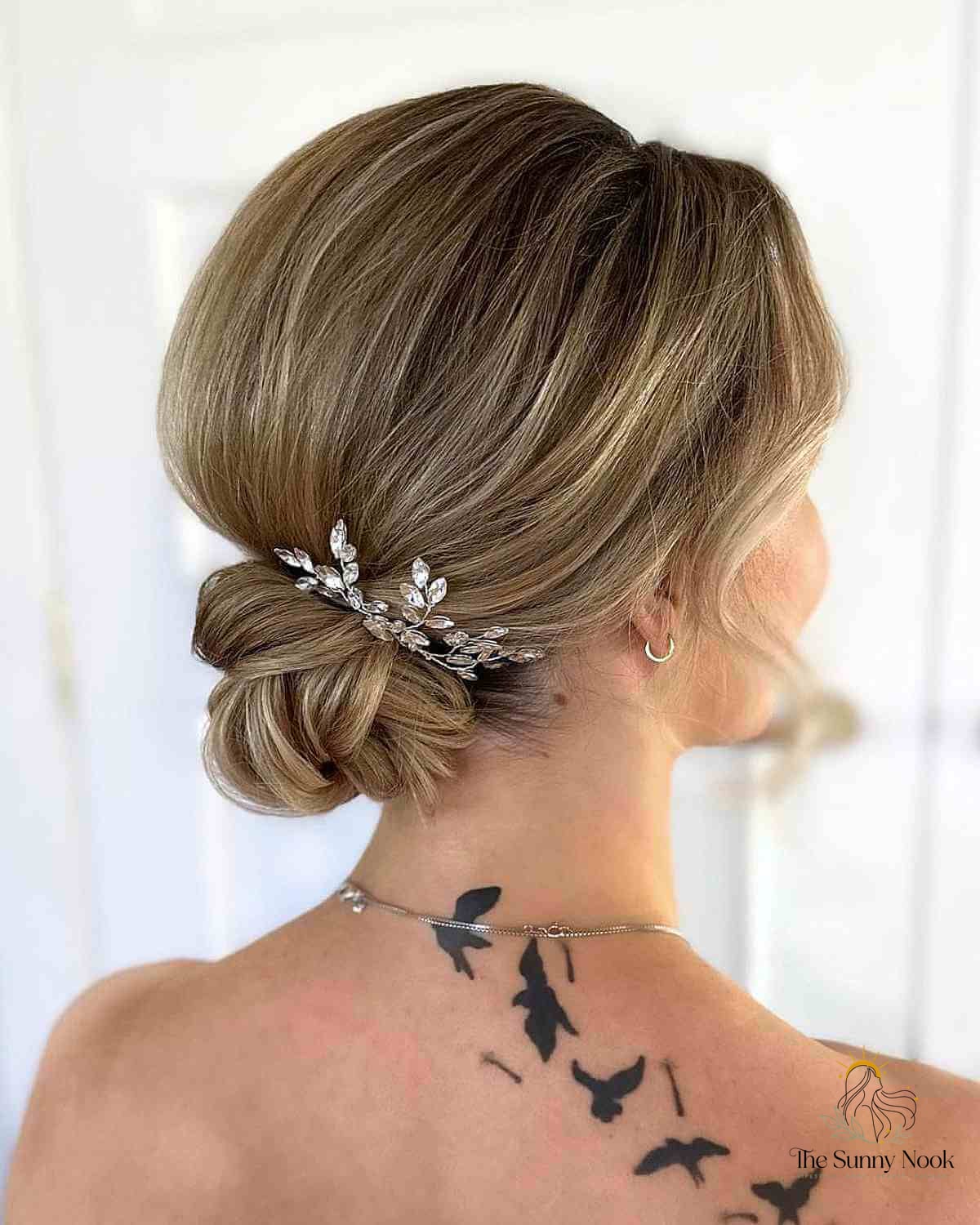 27 Slick Bun Hairstyles We're Obsessed With Right Now 19 Elegant Low Bun Style
