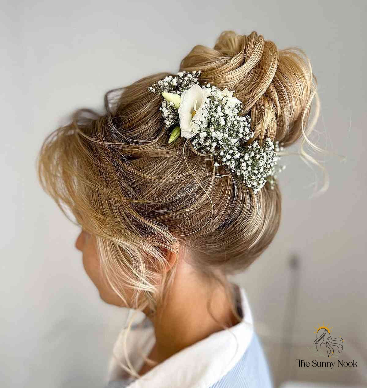 27 Slick Bun Hairstyles We're Obsessed With Right Now 14 Formal Bun Updo with Hair Accessories