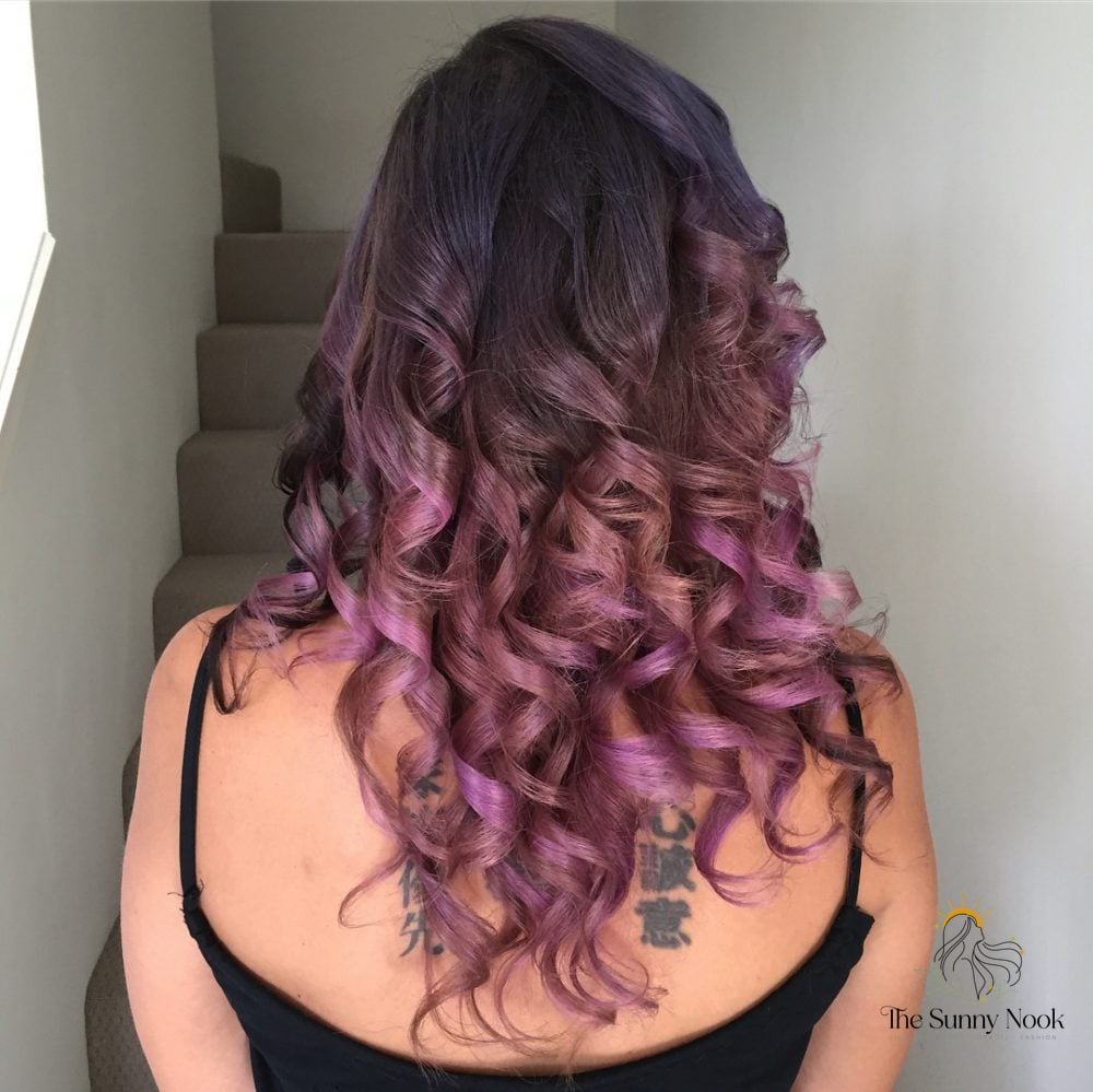 18 Updo Curly Hairstyles to Transform Your Look Instantly 2 Fun & Bouncy Curls with Purple Tones