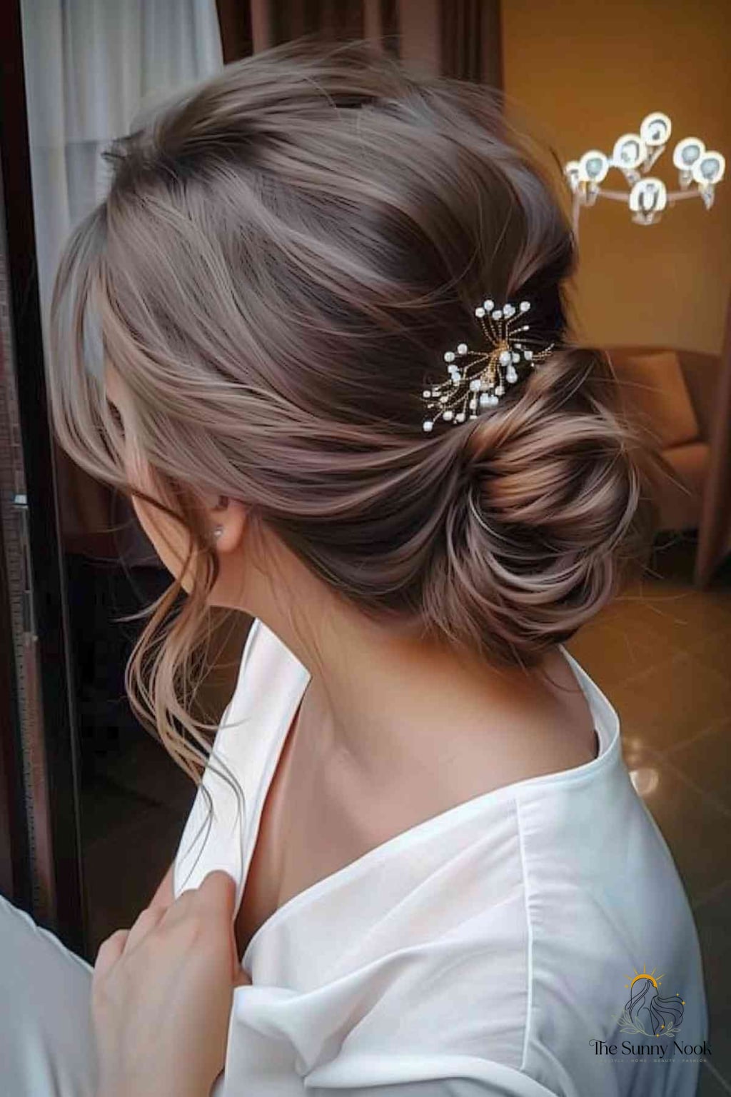 25 Wedding Hairstyles Updo We're Obsessed With Right Now 8 Glamorous Twirl Low Bun