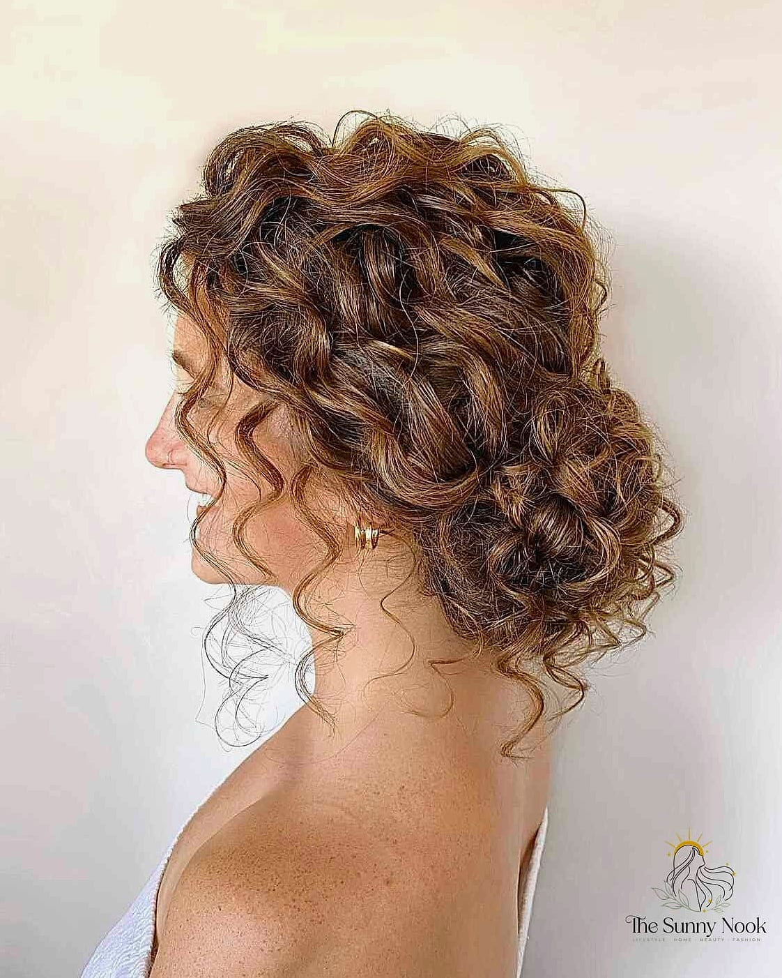 18 Updo Curly Hairstyles to Transform Your Look Instantly 12 Half Up Half Down Bun Ideas