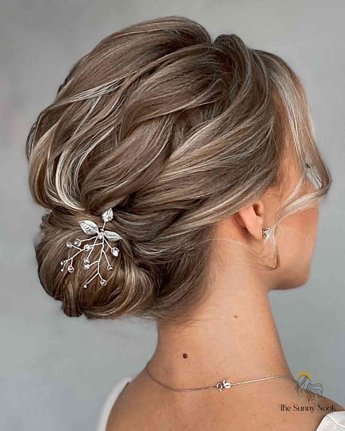 12 Side Bun Hairstyles We're Obsessed With Right Now 4 Intricate Bun Updo