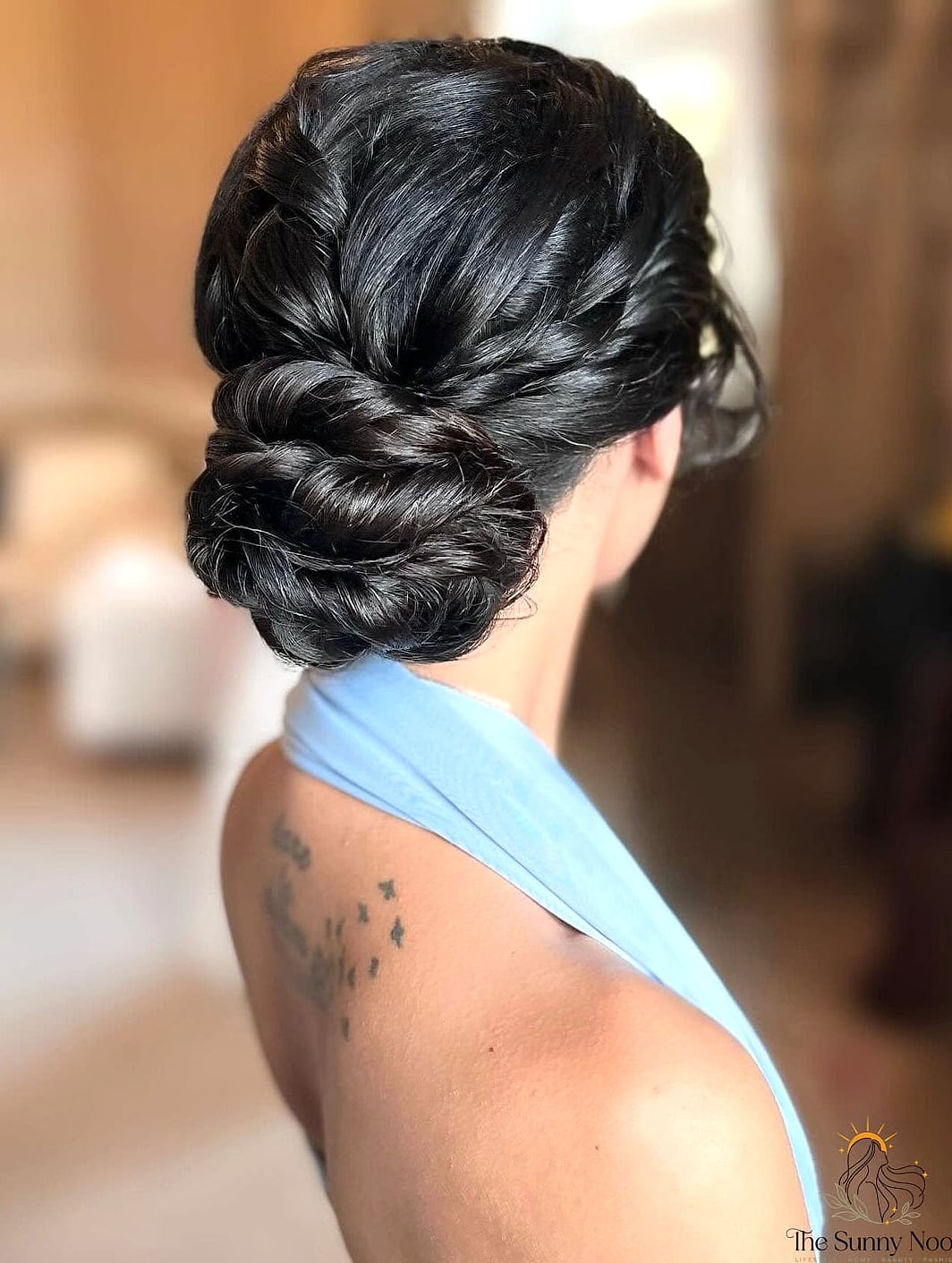 19 Messy Bun Tutorial For Medium Hair That Belong on Your Inspiration Board 6 Jet Black Mini Bun with Wispy Bangs
