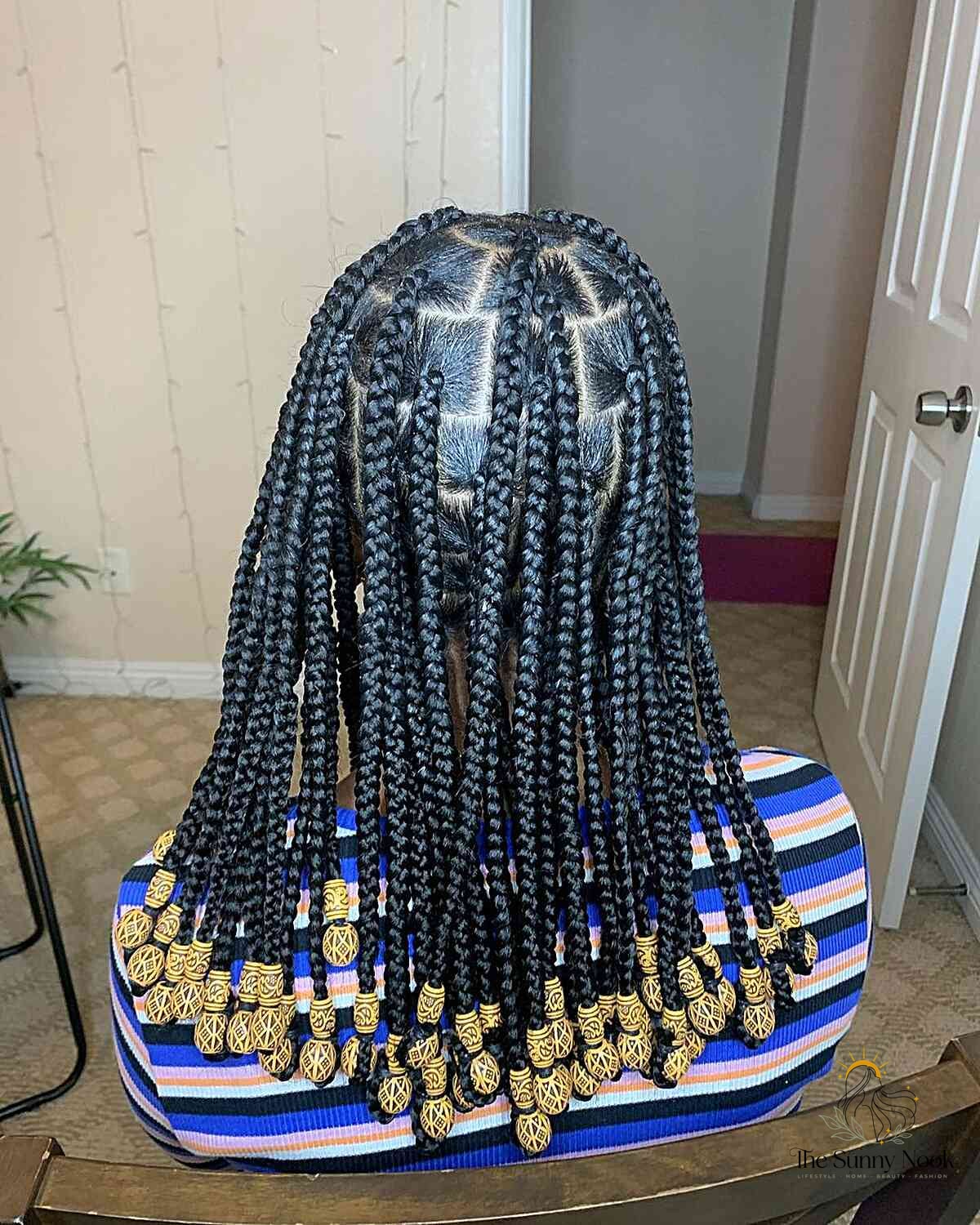 11 Cute Braid Hairstyles to Save Before They Blow Up 9 Knotless Box Braids with Wooden Beads