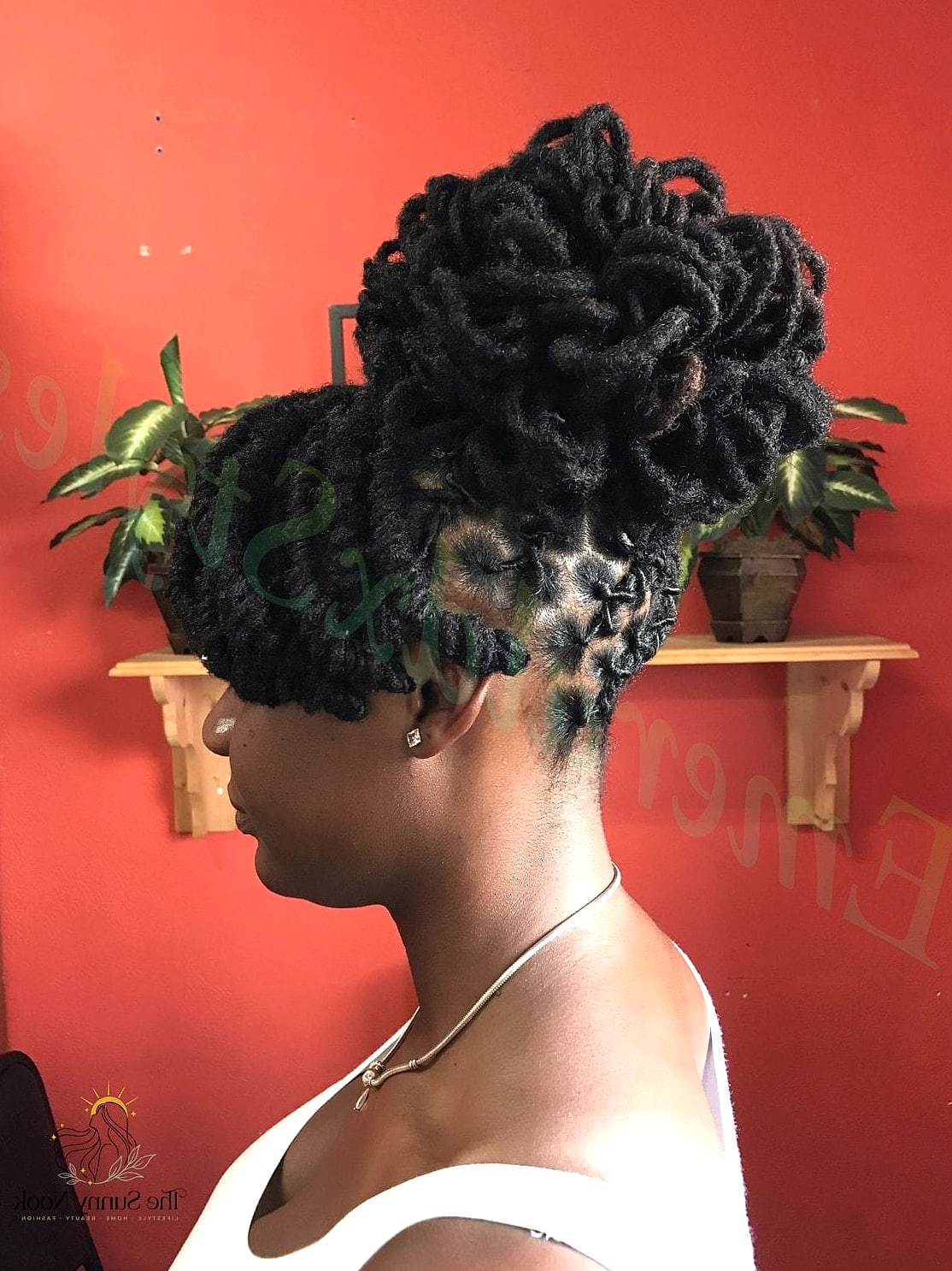 Loc Updo with Shaved or Braided Sides