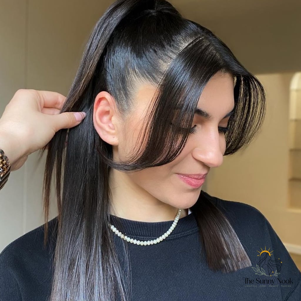 27 Ponytail Hairstyles Short Hair You'll Want to Re-Create Immediately 6 With Long Curtain Bangs