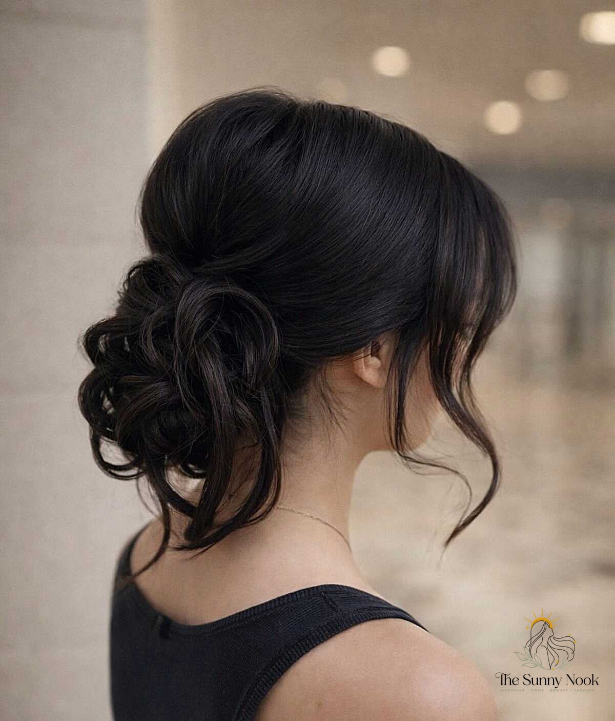 11 Low Bun Hairstyles For Black Women That Are Trending on Pinterest This Week 6 Loose Curled Gathering on Voluminous Black Hair