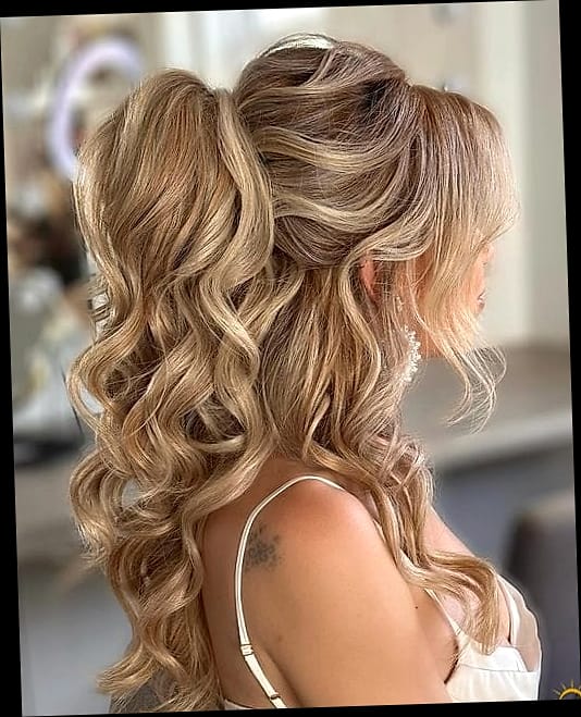27 Ponytail Hairstyles Short Hair You'll Want to Re-Create Immediately 19 Loose Half-Down Braid with Gold Charm Accents