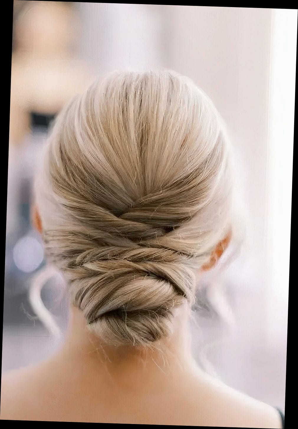 Low Bun with Twisted Front Sections