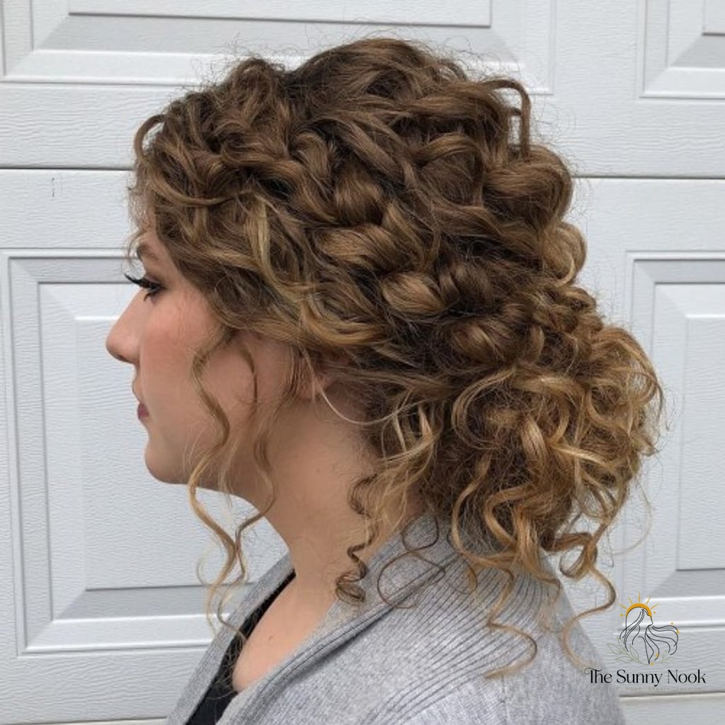 Low Curly Bun with Loose Curls