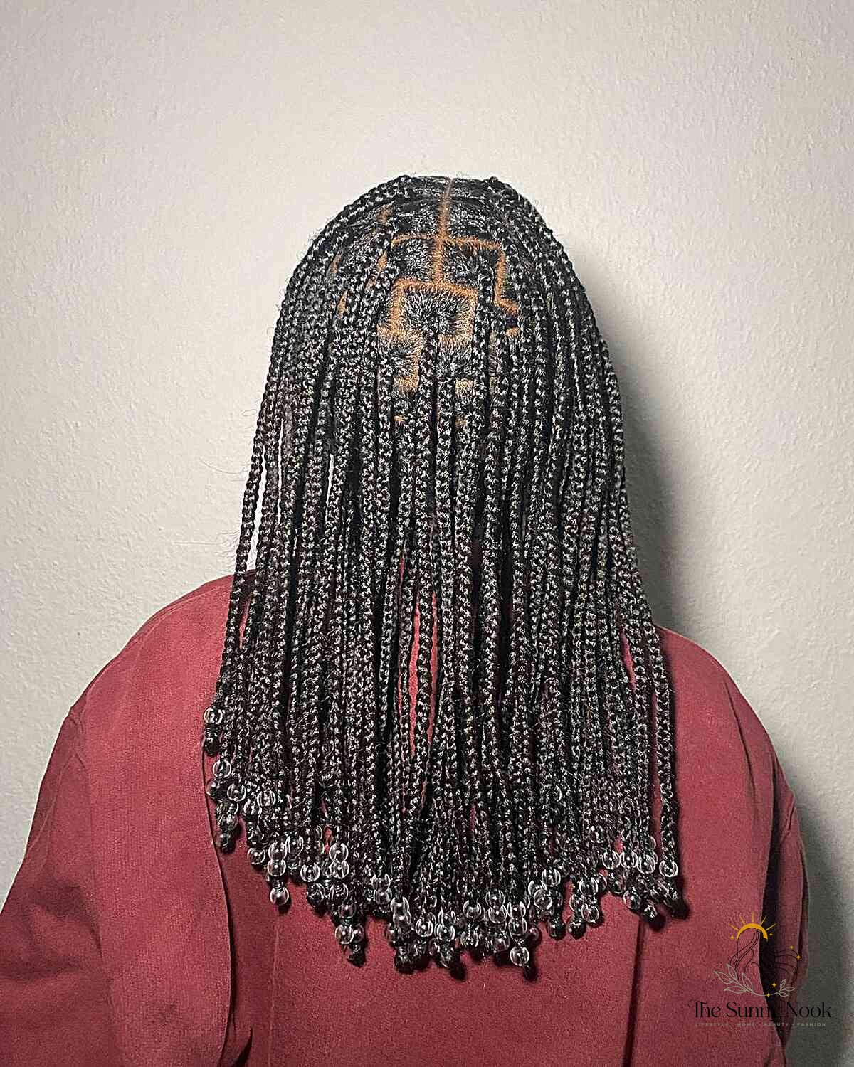 10 Color Knotless Braids for the Ultimate Glow Up 5 Medium-Length Brick Layered Braids