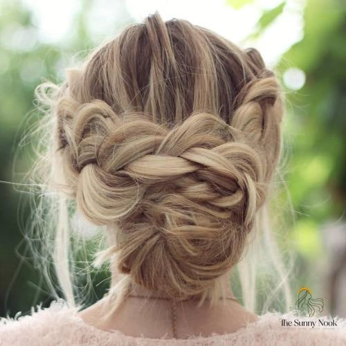 11 Low Bun Hairstyles For Black Women That Are Trending on Pinterest This Week 5 Messy Dimensional Braid Updo
