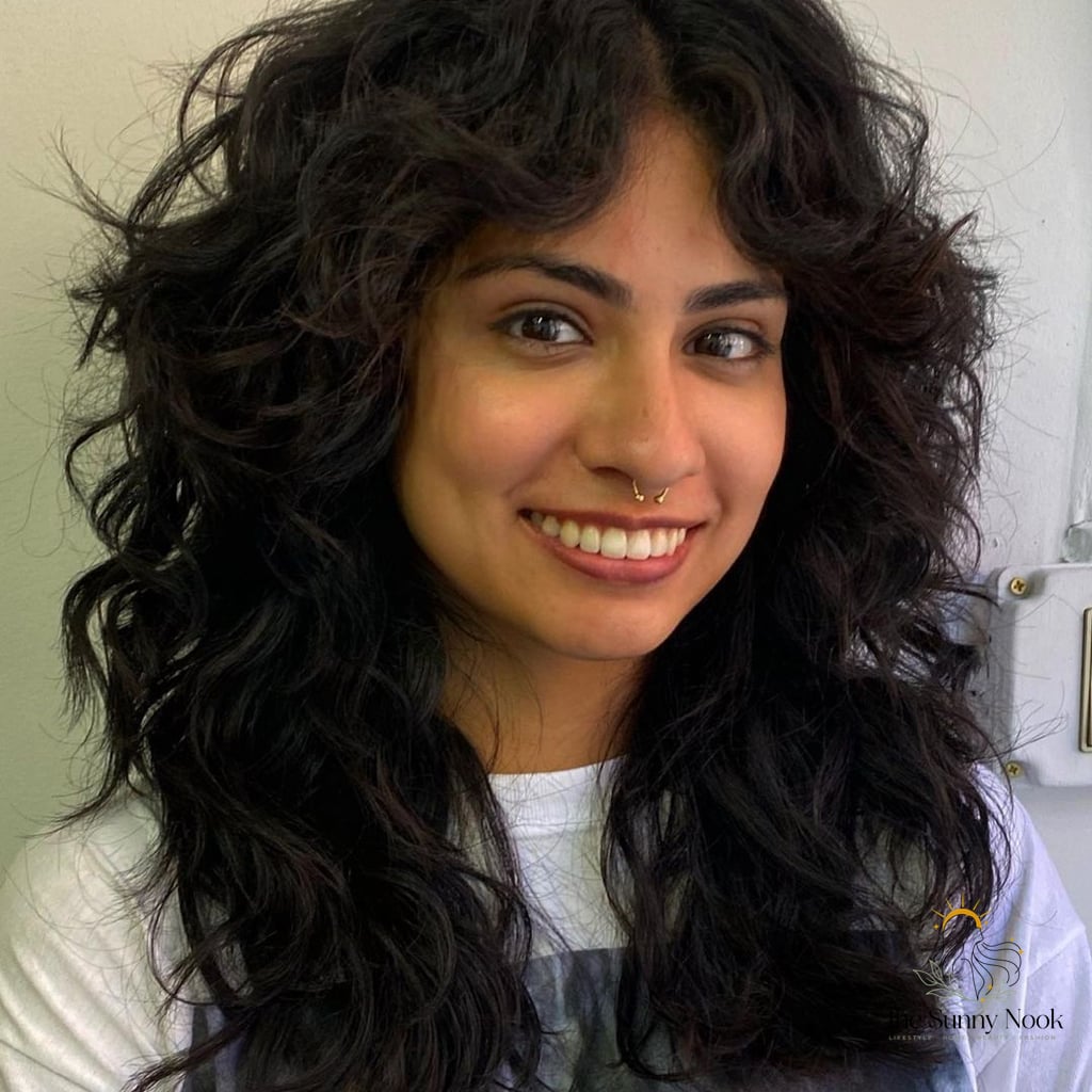 7 Easy Shoulder Length Hairstyles That Prove This Trend Is Here to Stay 6 Middle-Part Curly Bangs