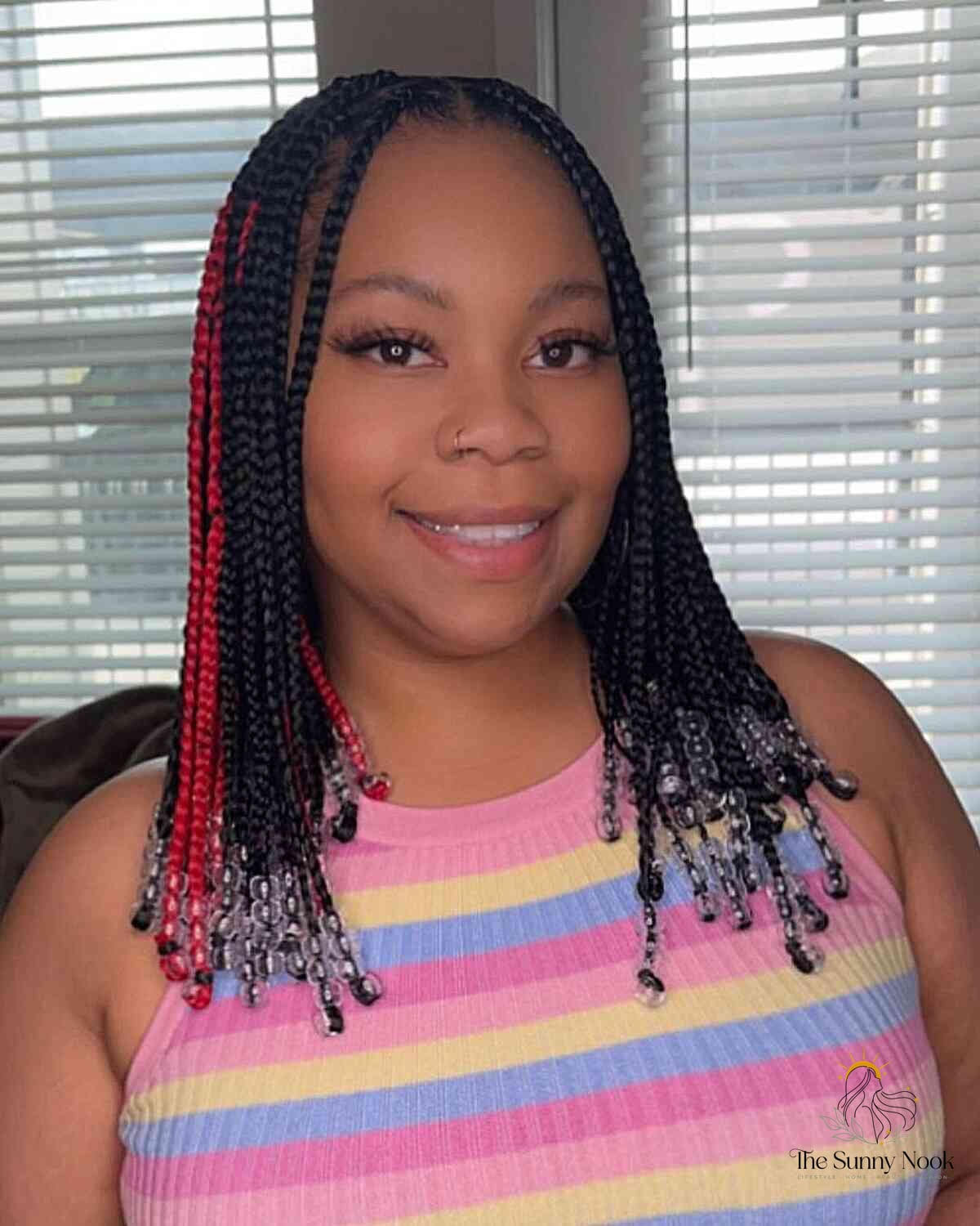 10 Color Knotless Braids for the Ultimate Glow Up 7 Middle-Parted Stitch Braids with Beads