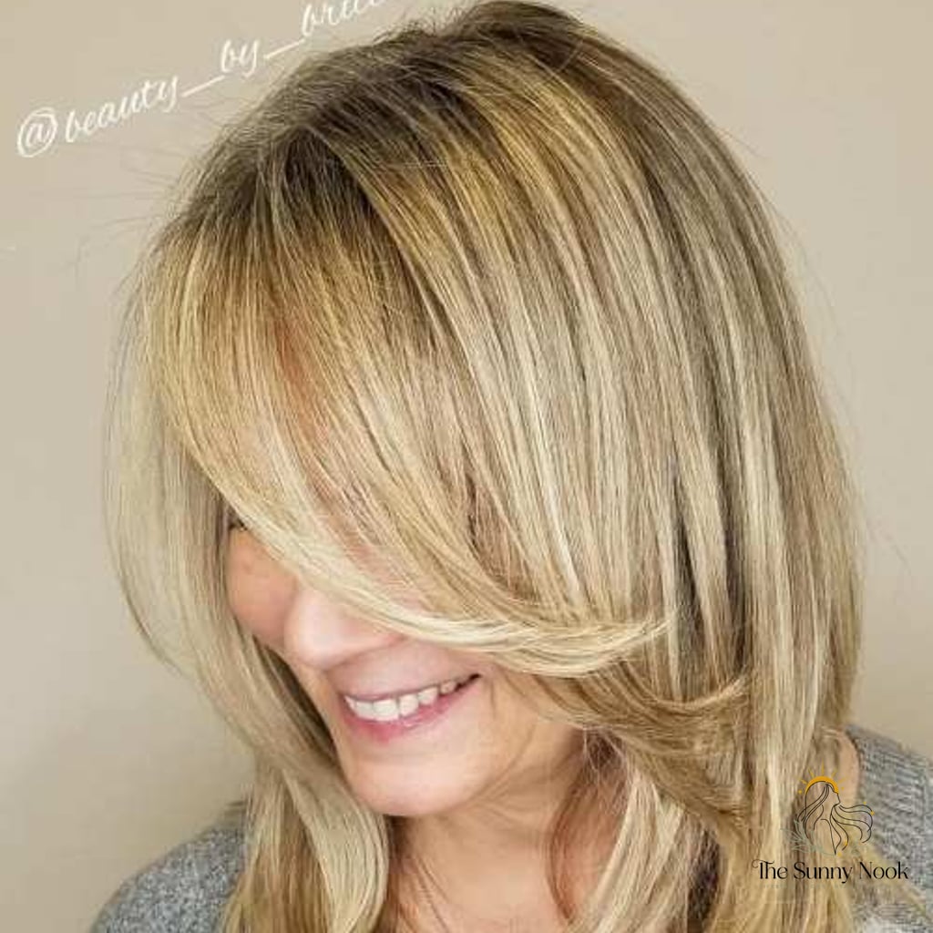 21 Cute Hairstyles For Short Curly Hair That Belong on Your Inspiration Board 19 Midi Cut with Feathered Bangs