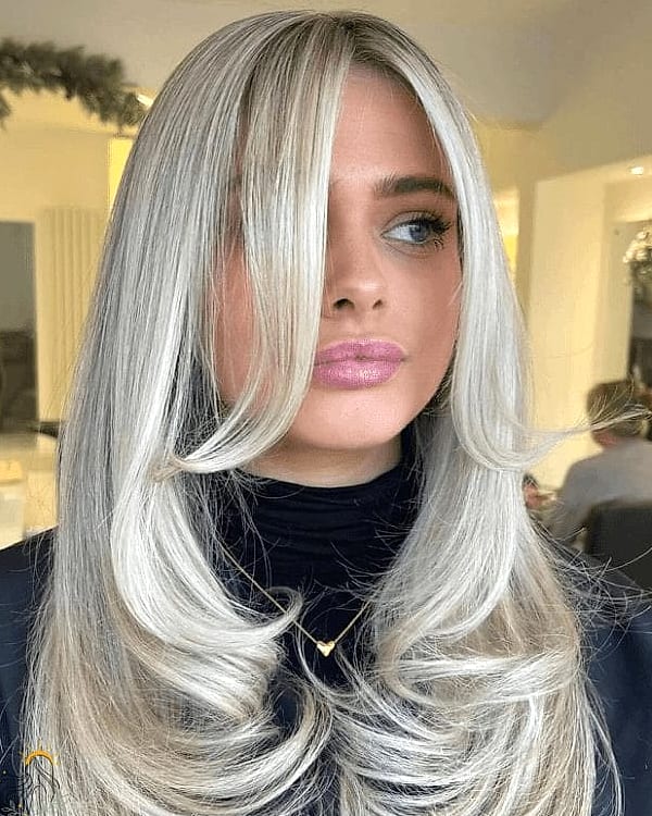 20 Hairstyles For Very Short Hair We're Obsessed With Right Now 12 The Polished Ash Blonde Bob with Side Sweep