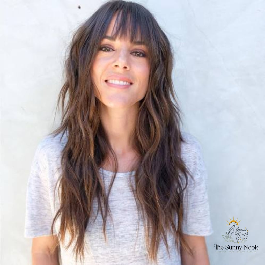 14 Tomboy Hairstyles For Long Hair to Transform Your Look Instantly 7 Razored Cut with Light Bangs