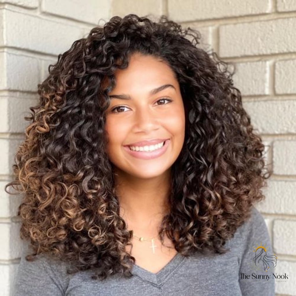 18 Gorgeous Curly Hair Inspo Hairstyles for Every Hair Type 5 Rezo Cut with Blonde Highlights
