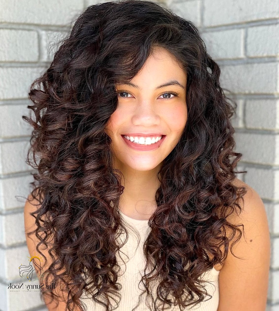 Rezo-Inspired Loose Bun for Thick Curls