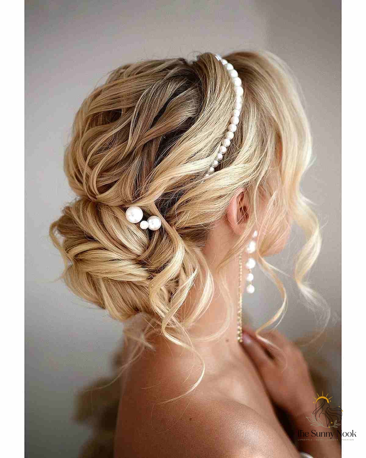 27 Slick Bun Hairstyles We're Obsessed With Right Now 21 Romantic Bun with Pearl Accessories