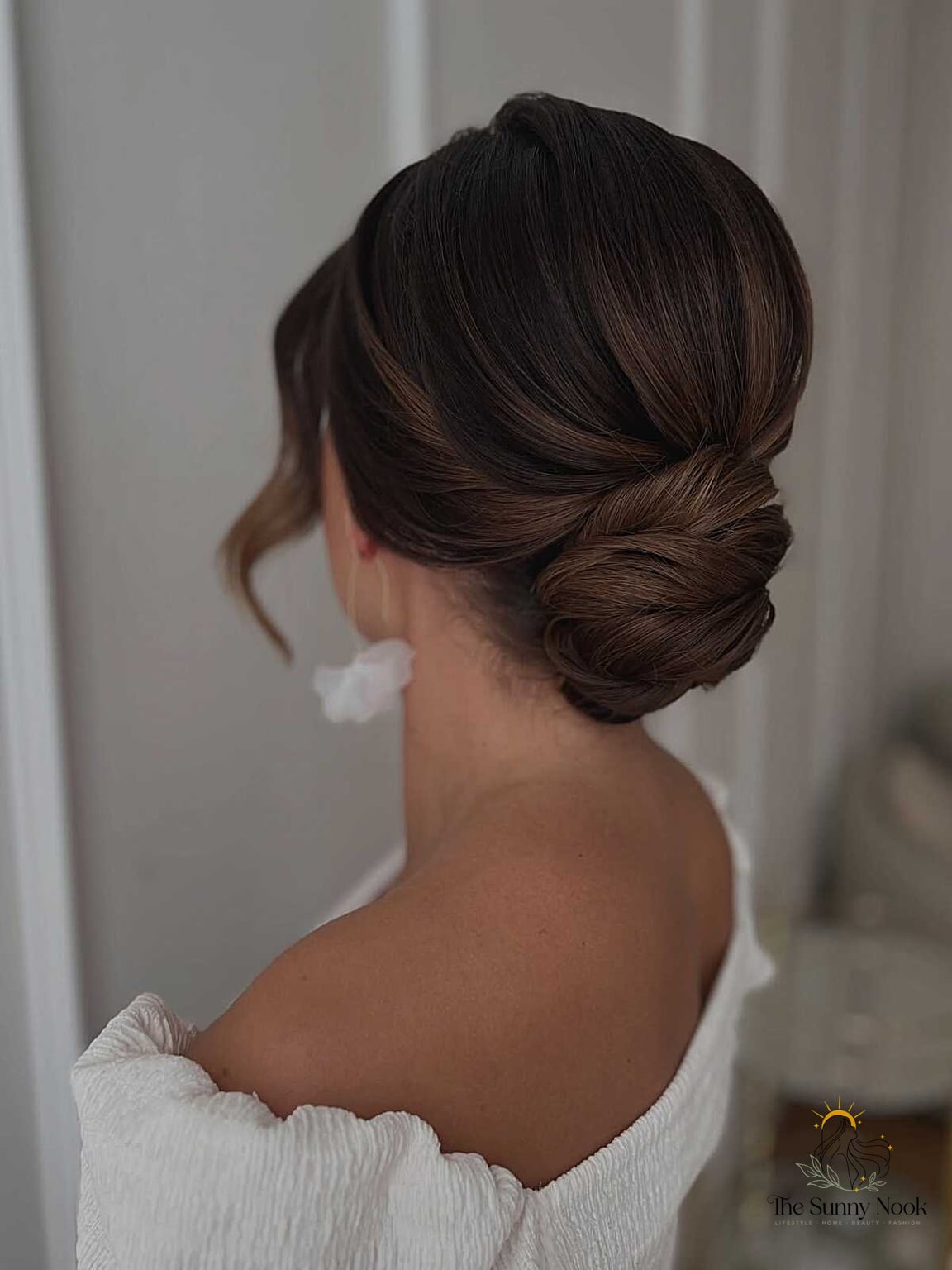 11 Low Bun Hairstyles For Black Women That Are Trending on Pinterest This Week 12 Sculpted Figure-Eight Bun on Rich Chocolate Brown Hair
