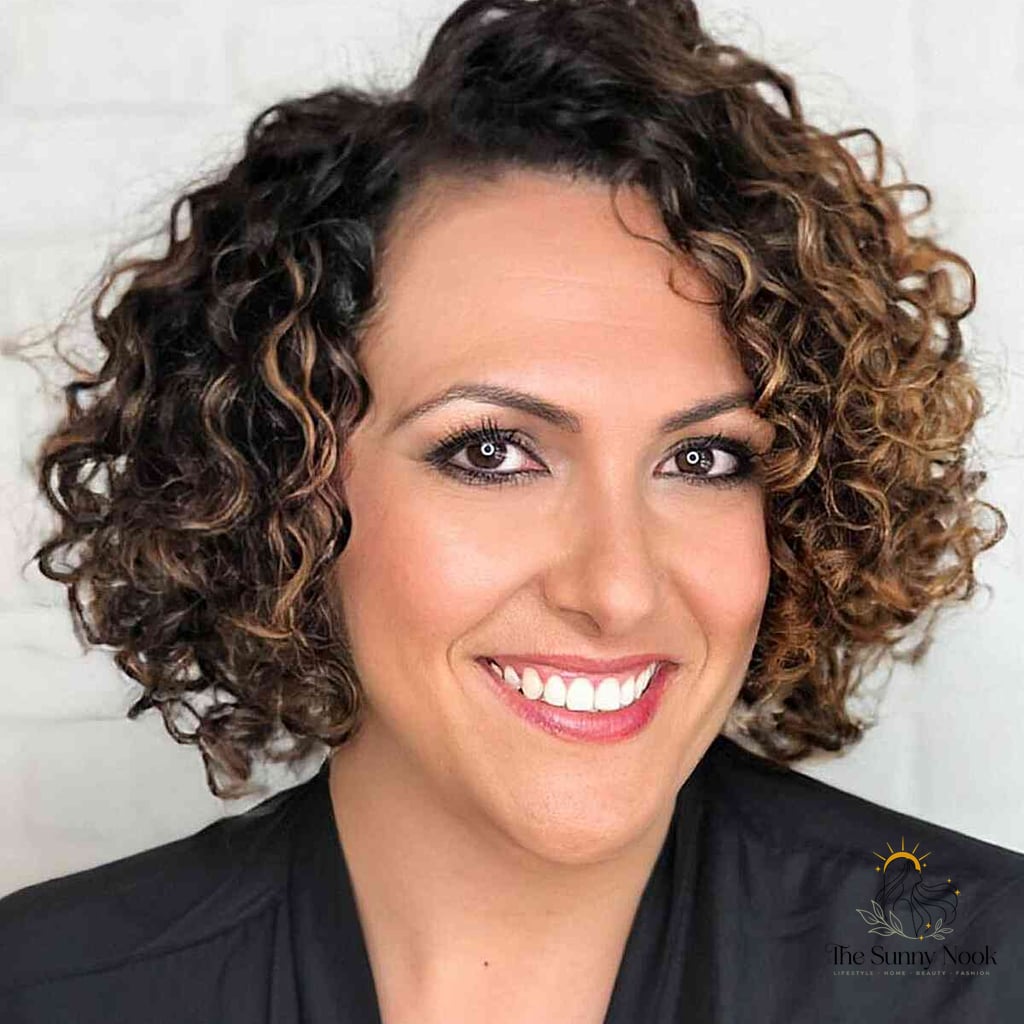 25 Hairstyles Short Curly Hair That Belong on Your Inspiration Board 8 Side-Parted Caramel Balayage Curls