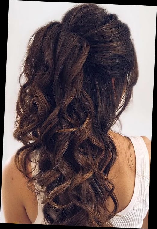 16 Curly Hair Prom Hairstyles That Belong on Your Inspiration Board 12 Sleek Curly Half Updo with Middle Part