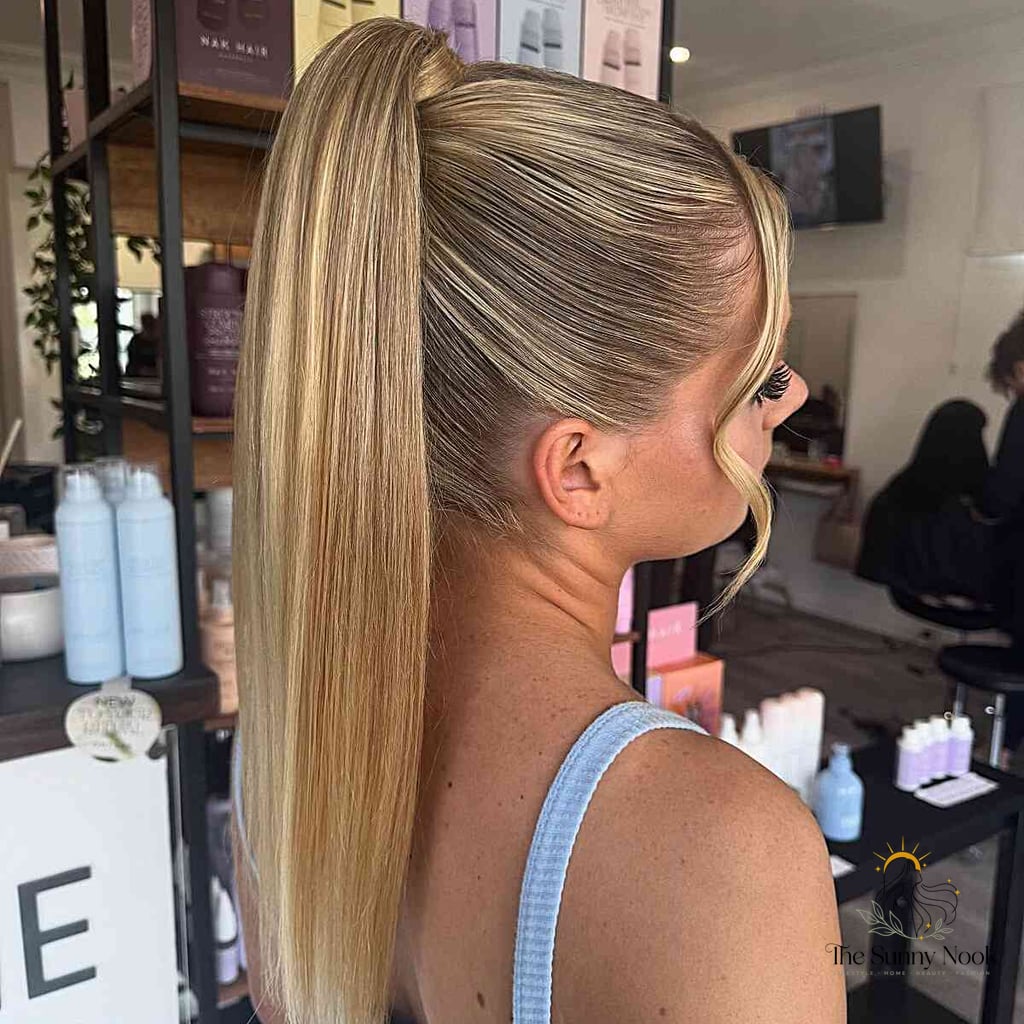 21 Casual Hairstyles For Long Hair That Are Actually Easy to DIY 3 Sleek High Ponytail with Subtle Waves