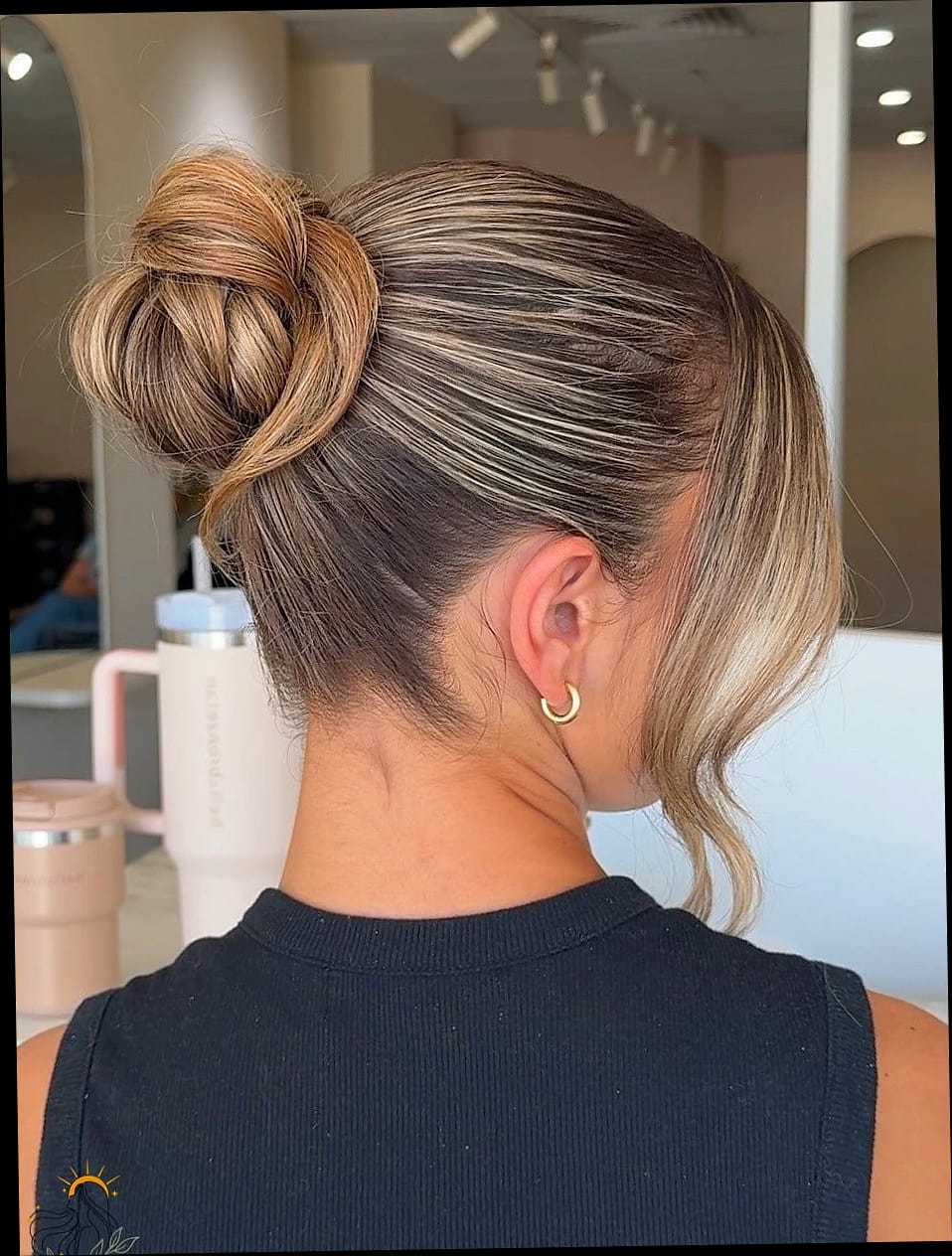 Sleek High Bun with a Sock Bun Base