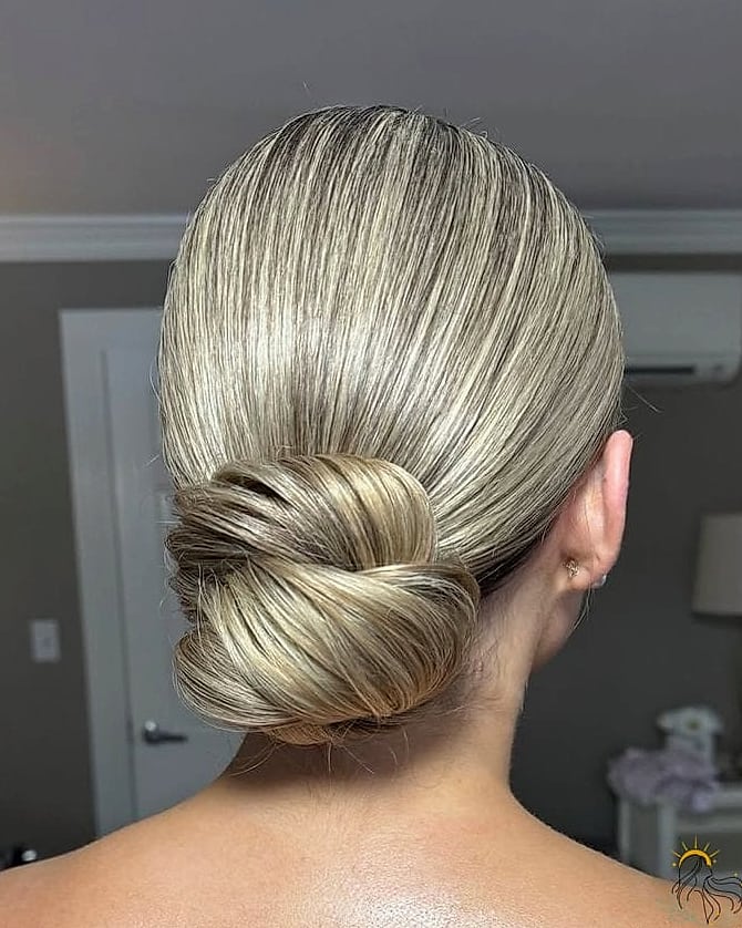 20 Updo Hairstyles For Short Hair to Transform Your Look Instantly 12 The Slicked Back Ponytail Updo