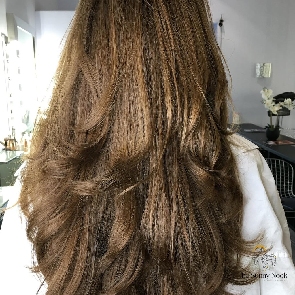 21 Casual Hairstyles For Long Hair That Are Actually Easy to DIY 4 Softly Layered Long Hair with Natural Movement