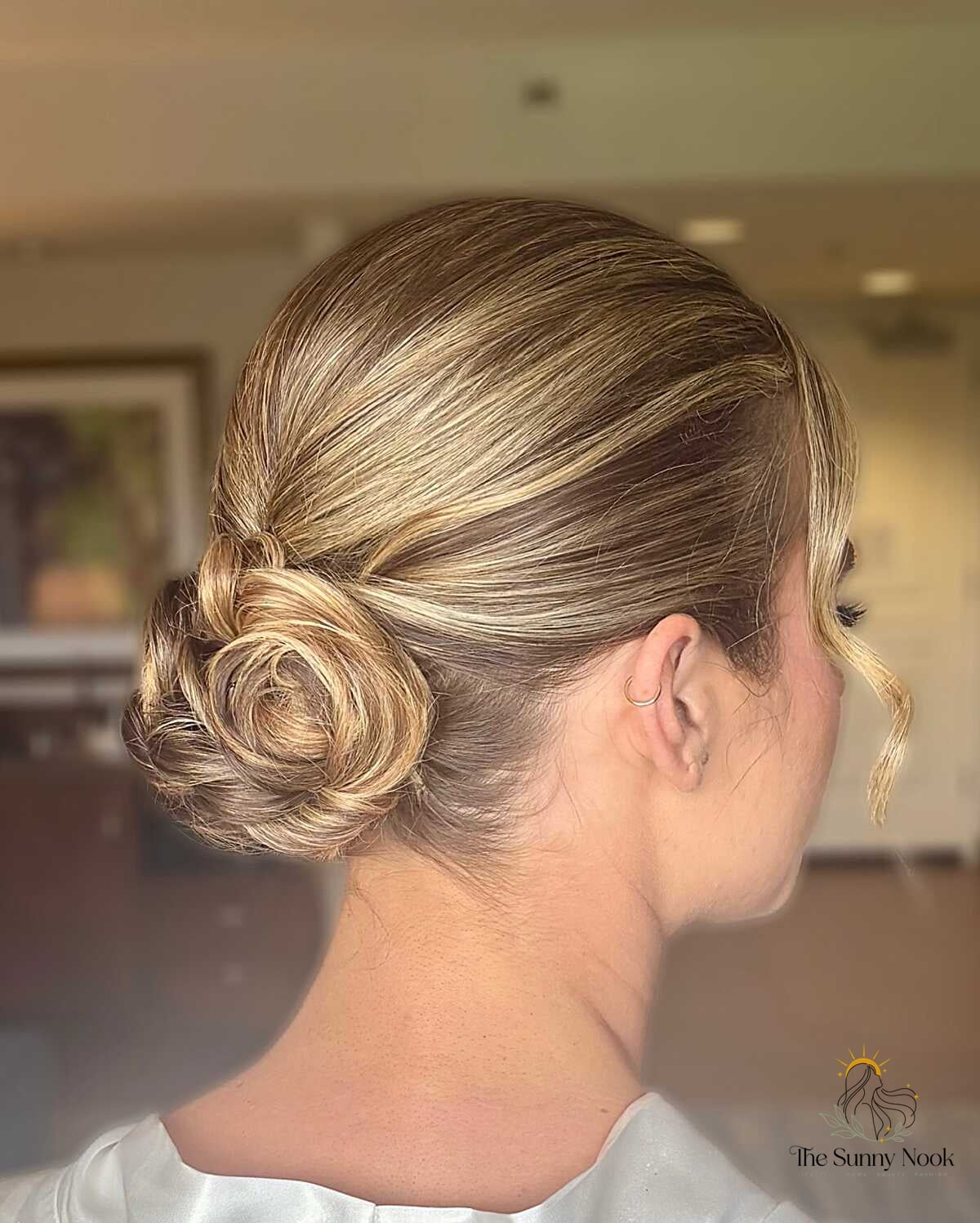 11 Low Bun Hairstyles For Black Women That Are Trending on Pinterest This Week 10 Spiral Rosette Bun on Sandy Blonde Highlights