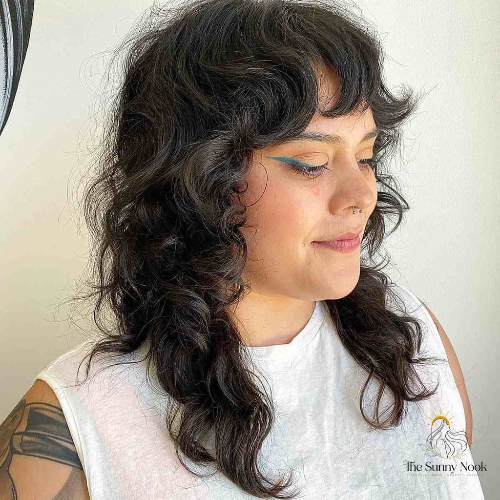 12 Gorgeous Medium Hair Hairstyles for Every Hair Type 3 Trendy Medium Shaggy Mullet with Soft Curls