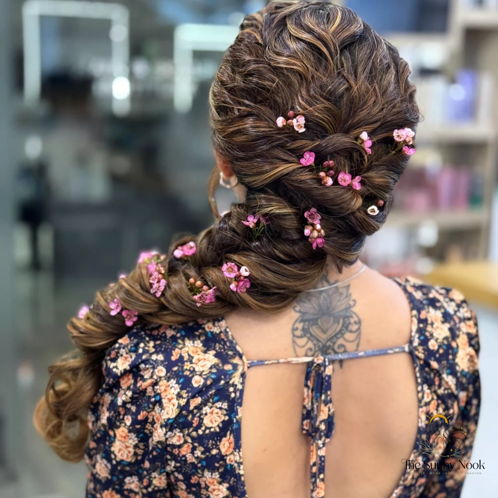 23 Braid Hairstyles For Long Hair You'll Want to Re-Create Immediately 8 A Twisted Braid with Flowers That Actually Looks Natural
