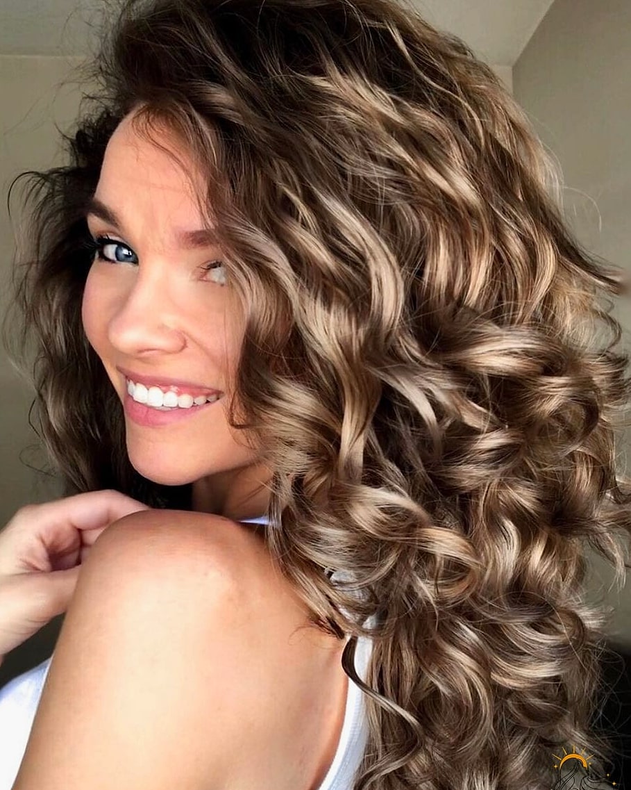 14 Hairstyles For Short Wavy Hair Perfect for Your Next Salon Appointment 13 Understanding Curly Pixie Cuts