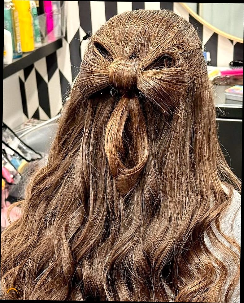 27 Half Up Hairstyles For Long Hair for the Ultimate Glow Up 20 Voluminous Bow