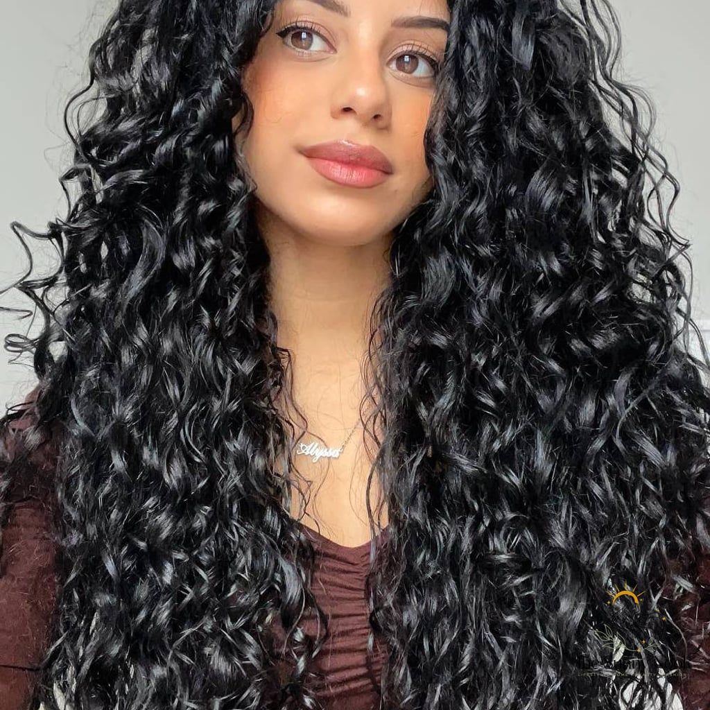 21 Casual Hairstyles For Long Hair That Are Actually Easy to DIY 11 Voluminous Long Spirals with Defined Curls
