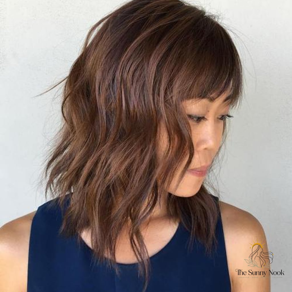 20 Short Korean Hairstyles Perfect for Your Next Salon Appointment 11 Wavy Lob with Bangs